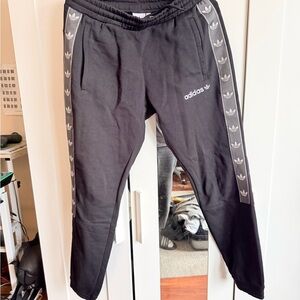 Adidas Black Joggers with Gray Logo Stripes